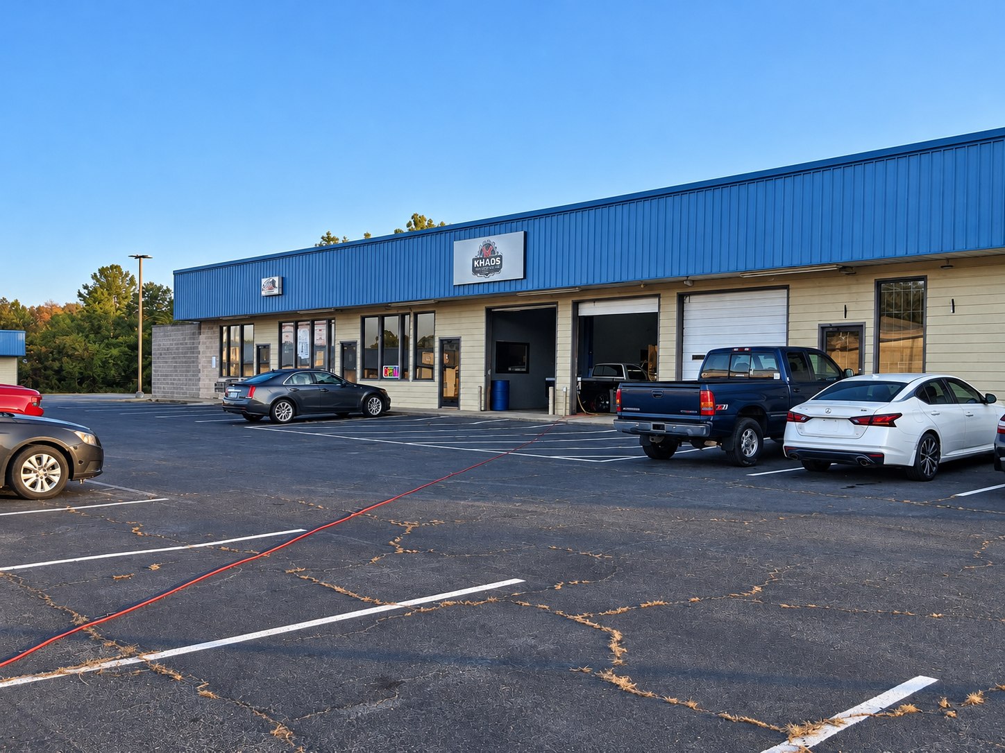 Khaos Automotive storefront and open service bays in Macon, Georgia