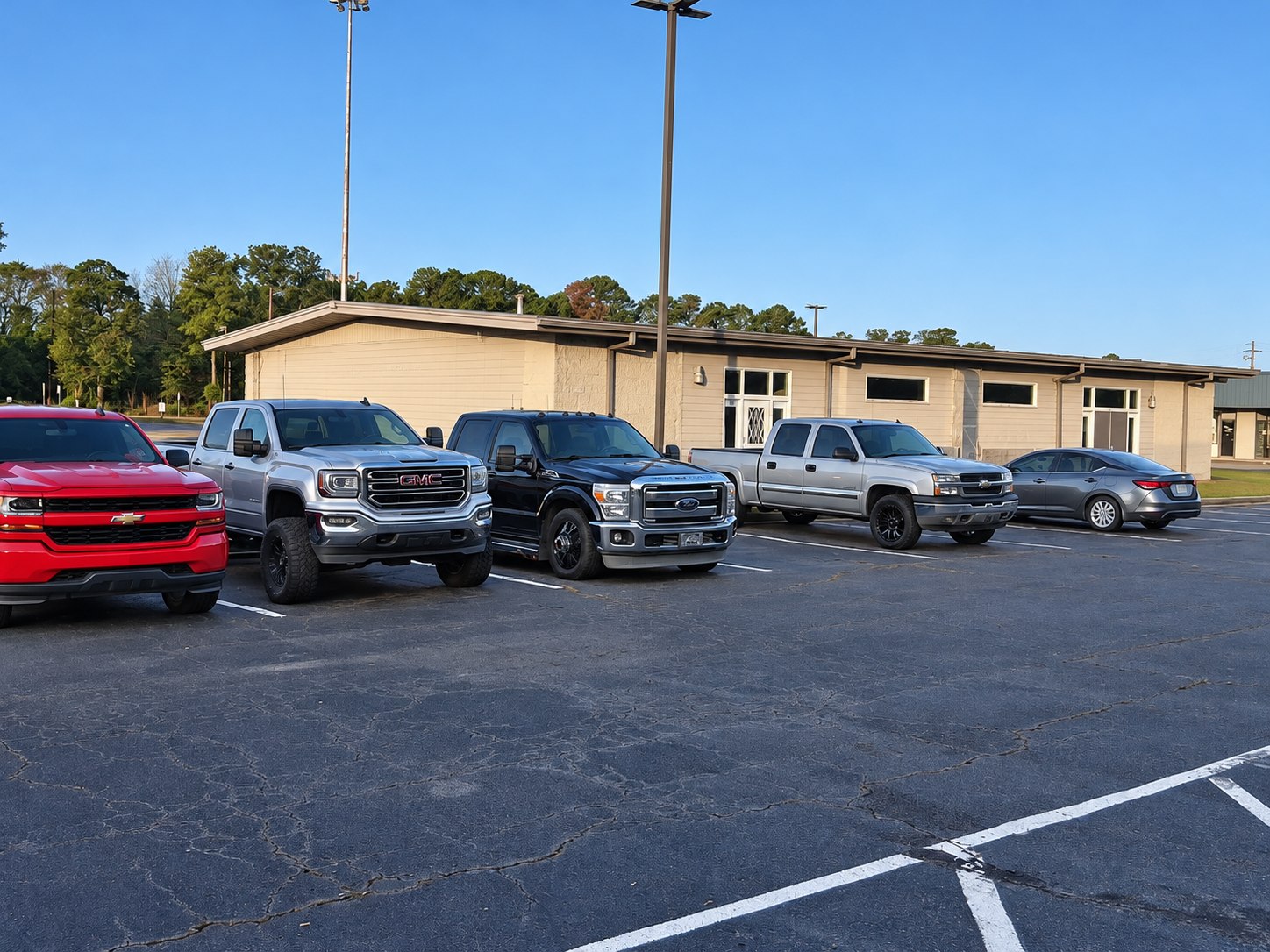 Lineup of vehicles outside the Khaos Automotive shop in Macon, Georgia
